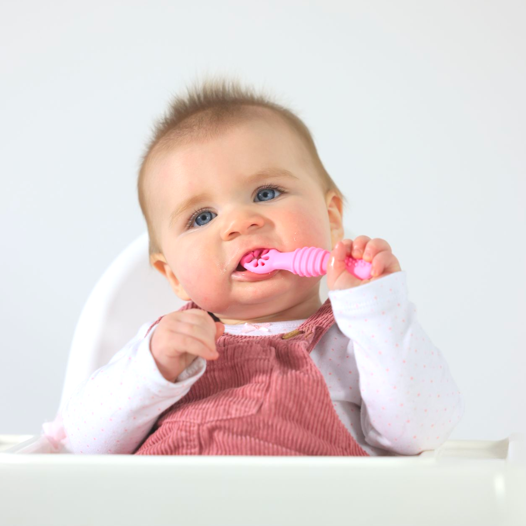 Silicone training spoon teether, pink teether